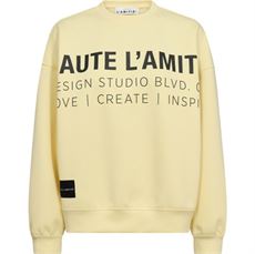 HAUTE L`AMITIÉ SWEATSHIRT, STUDIO LOGO SWEAT, PALE YELLOW